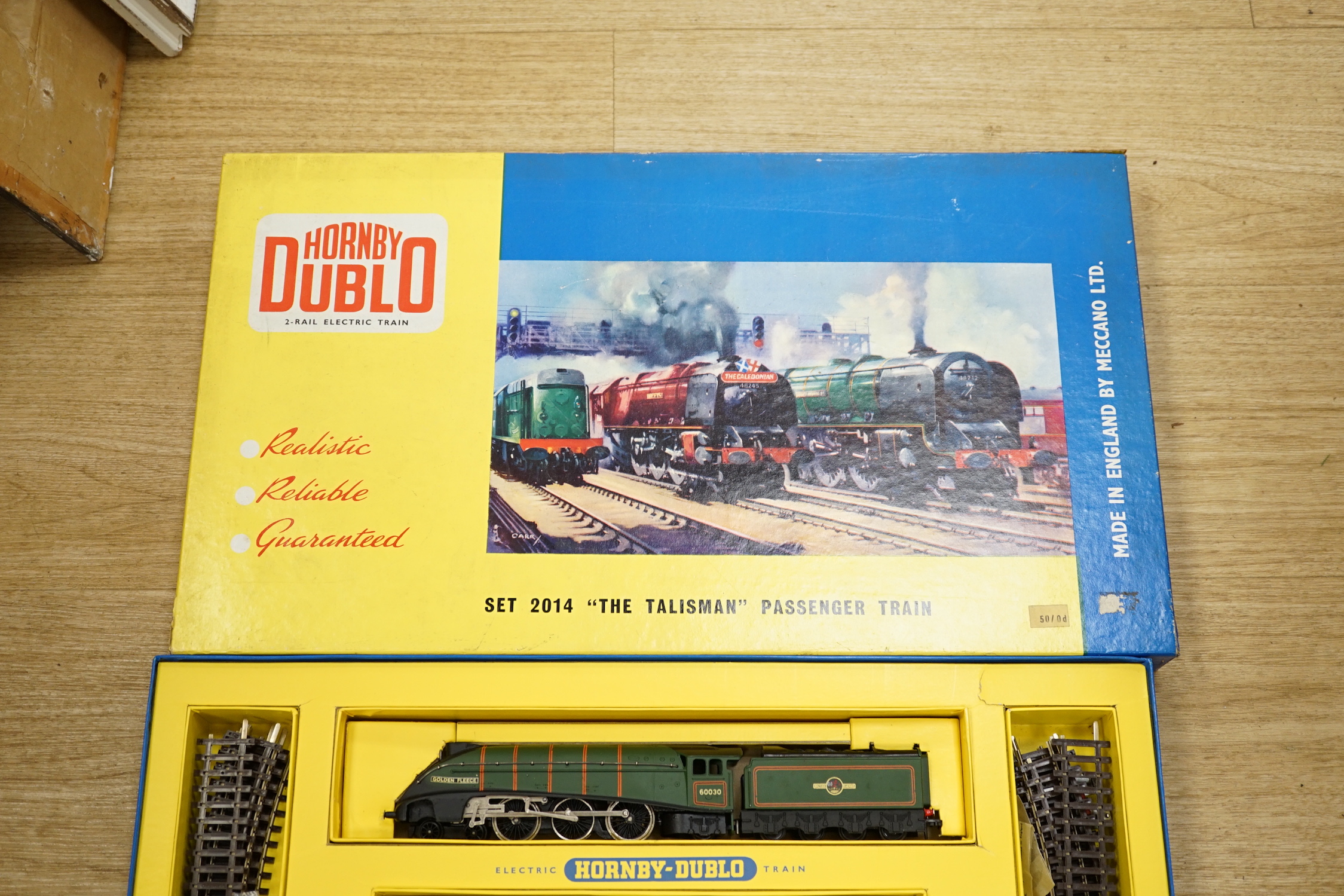 Two boxed Hornby Dublo 2-rail train sets; Set 2014 ‘The Tallisman’ Passenger train set and Set 2033 Co-Bo Diesel Electric Goods Train set